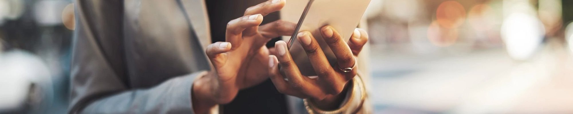 person using smartphone - Floors Of Wilmington in the Wilmington, NC area