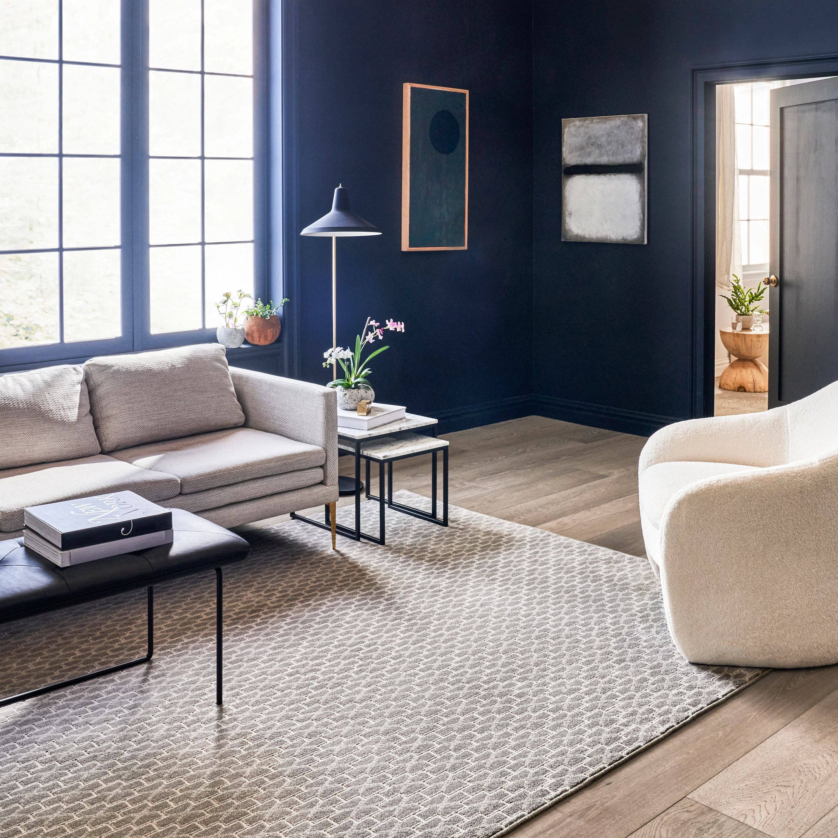 Couch and armchair on rug from Floors Of Wilmington in the Wilmington, NC area